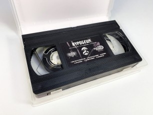 Sticker printed VHS tapes in clear cases with outer cover insert