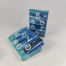 Transparent clear cassette tapes and cases, both with white on-body prints