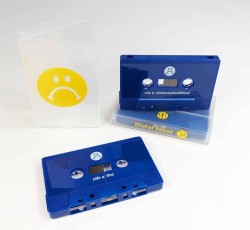 Solid dark blue cassette tapes in clear frosted cases with yellow on-body case prints