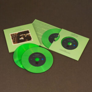A set of two green vinyl CDs in our 4 page double disc record-style wallets