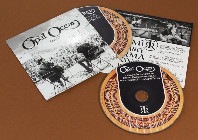 Offset litho printed CDs in card wallets with a gloss UV coating